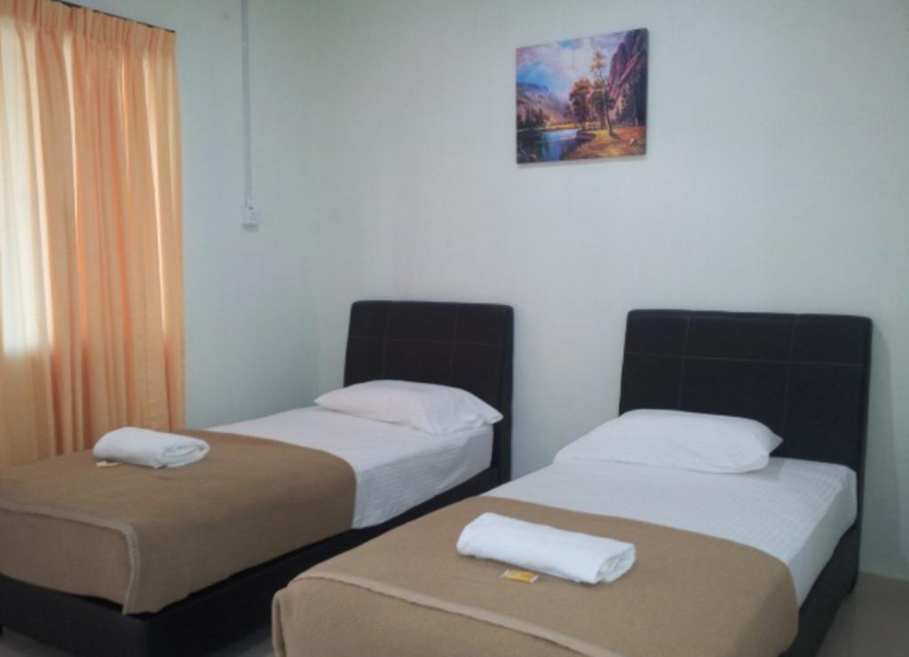 Huda Inn Pantai Cenang  Ruang foto