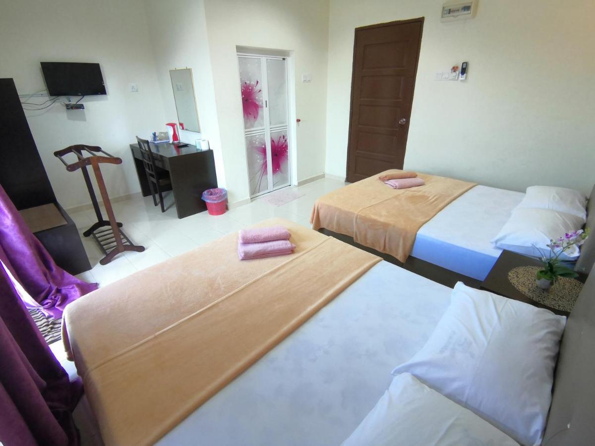 Huda Inn Pantai Cenang  Ruang foto
